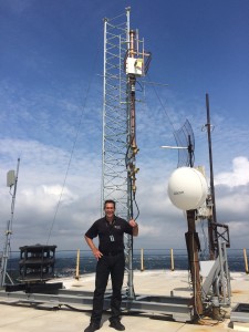 Chief Operator A.J. Fritz next to the "Tower of Power"
